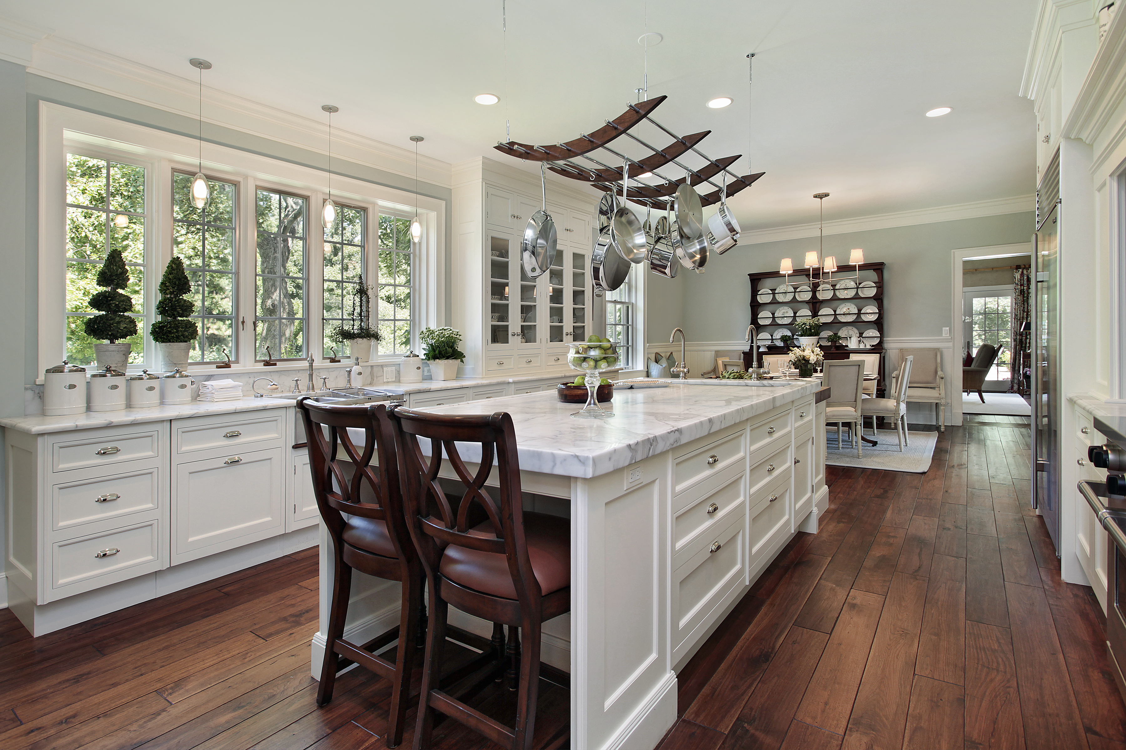Kitchen with white granite countertops