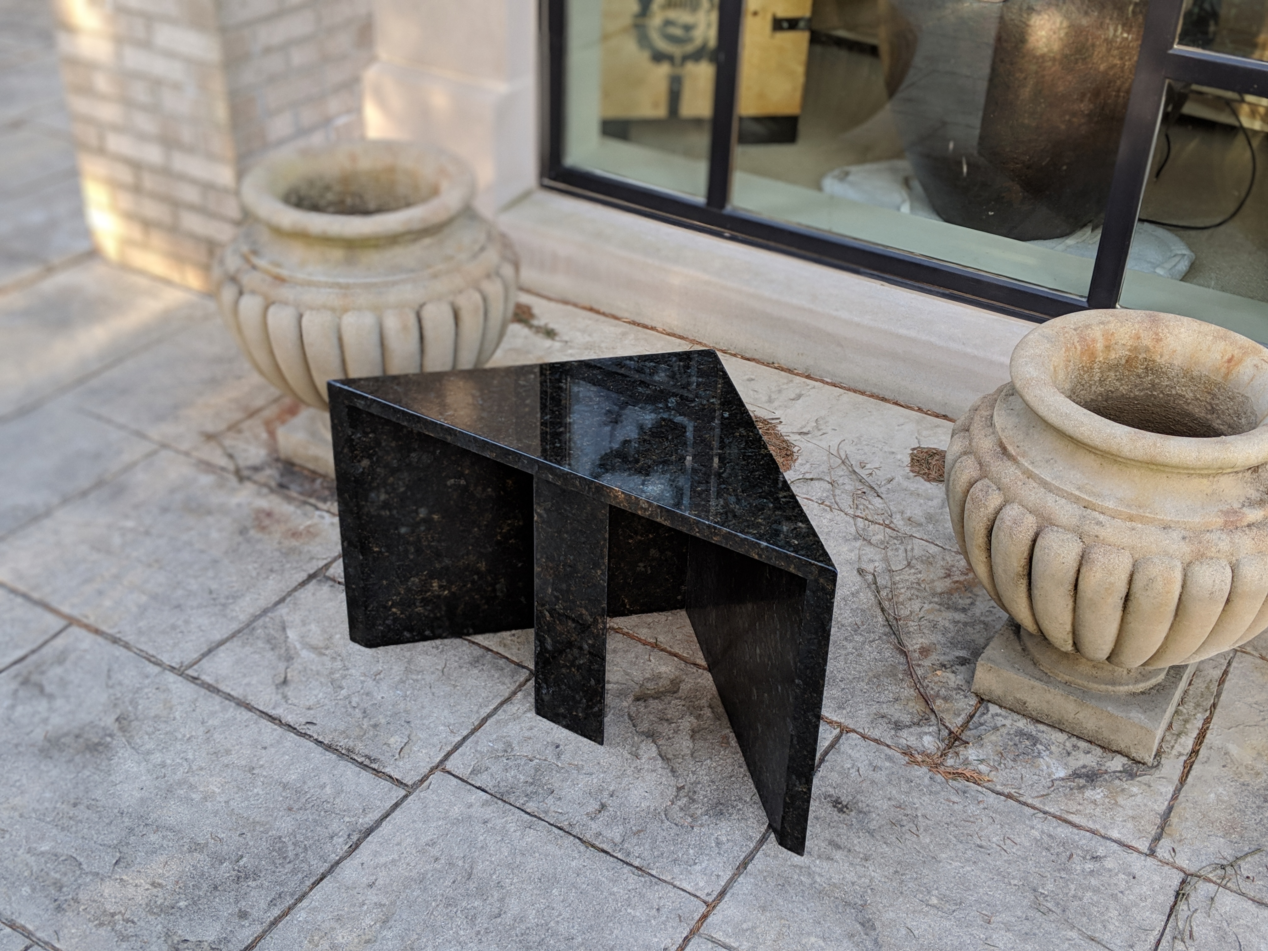 Outdoor seat made from granite remnants